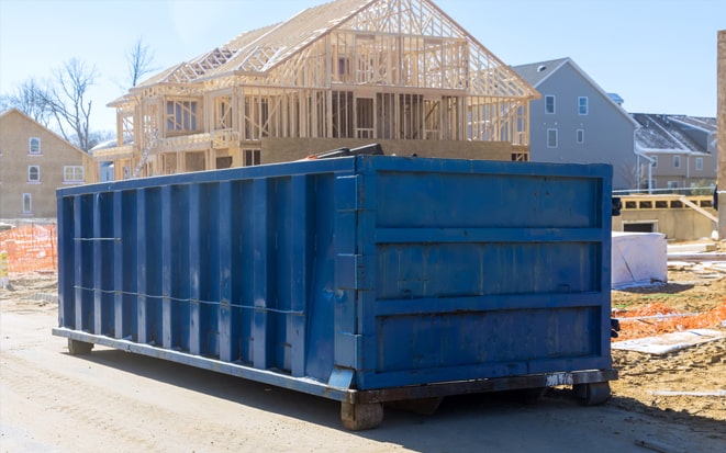 dumpster in driveway during home renovation